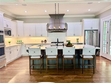 Tucked within one of the most sought-after gated communities - photo 3