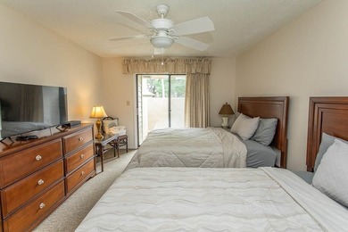 This stunning three-bedroom, two-bath, first floor villa, offers - photo 11