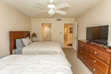 This stunning three-bedroom, two-bath, first floor villa, offers - photo 13