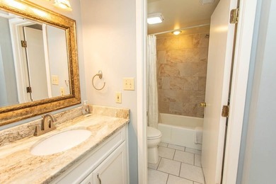This stunning three-bedroom, two-bath, first floor villa, offers - photo 15