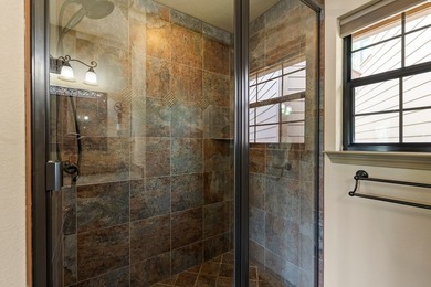 Timeless lakehouse-style home with a versatile guest house - photo 15