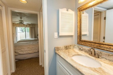 This stunning three-bedroom, two-bath, first floor villa, offers - photo 17