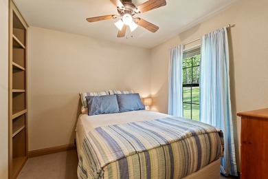 Timeless lakehouse-style home with a versatile guest house - photo 17