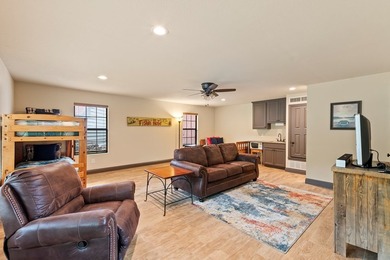 Timeless lakehouse-style home with a versatile guest house - photo 20