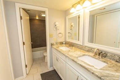 This stunning three-bedroom, two-bath, first floor villa, offers - photo 33