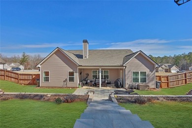 This beautifully maintained ranch goes beyond new construction