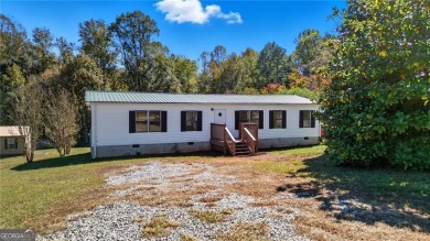 Lake Home For Sale in Cleveland, Georgia