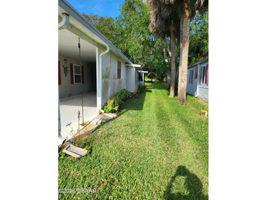 REDUCED!! 55-plus! Spacious 2/2, nice big yard. NO LOT RENT! - photo 4