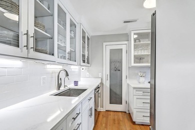 Move-in ready, tastefully updated 2-story, top floor unit in the