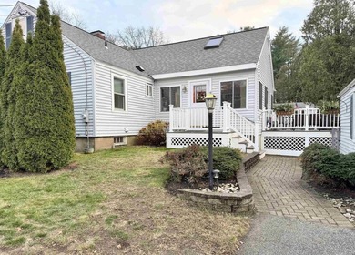 This beautifully maintained 3-bedroom, 2-bath Cape offers - photo 3