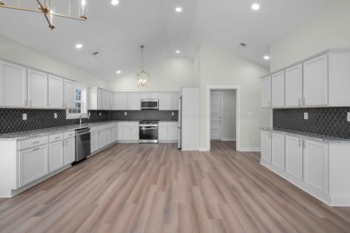 NEW CONSTRUCTION home tucked away in the gated community of - photo 3
