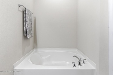 Welcome to this beautifully maintained 4-bedroom, 2-bath home in - photo 16