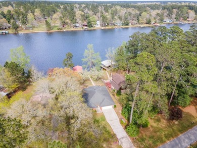 Wake up to breathtaking waterfront views in this beautifully - photo 16