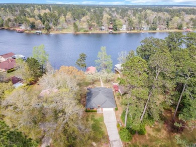 Wake up to breathtaking waterfront views in this beautifully - photo 17