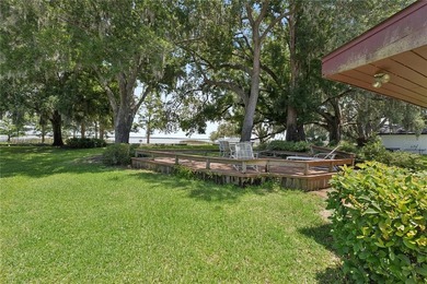 Welcome home to this stunning lakefront 4-bedroom, 2-bath - photo 25