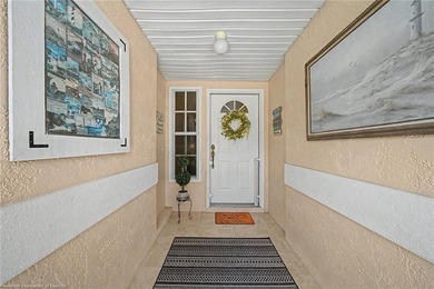 Immaculate Waterfront Living with Direct Lake Access! Nestled on - photo 10