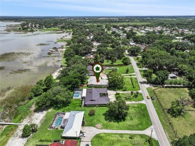 Welcome home to this stunning lakefront 4-bedroom, 2-bath - photo 32