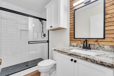 Wake up to breathtaking waterfront views in this beautifully - photo 41