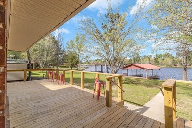 Wake up to breathtaking waterfront views in this beautifully - photo 45