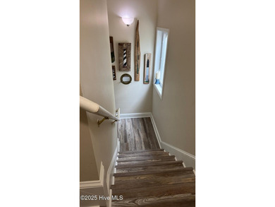 Rare opportunity on Oak Island. Step into the ultimate coastal