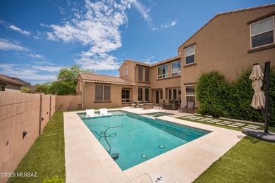 This gorgeous home is located the beautiful community of Saguaro