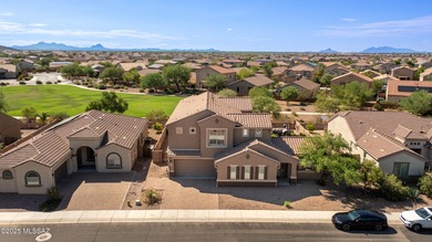 This gorgeous home is located the beautiful community of Saguaro