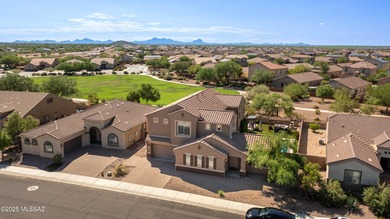 This gorgeous home is located the beautiful community of Saguaro