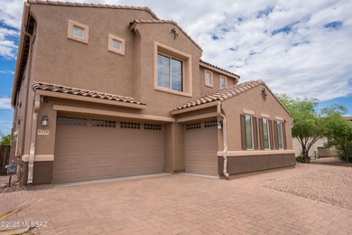 This gorgeous home is located the beautiful community of Saguaro
