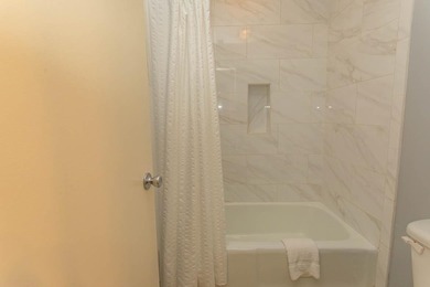 This stunning two-bedroom, two-bath, second floor villa offers - photo 17
