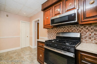 Welcome to 87 Bay 7 St-Beautiful all brick two family home - photo 20