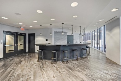 Welcome to elevated city living in this high-rise, luxury condo