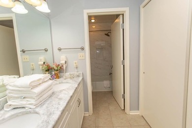 This stunning two-bedroom, two-bath, second floor villa offers - photo 32