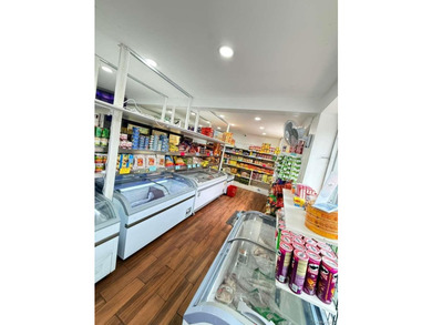 Opportunity to own a fully operational Supermarket near the - photo 5