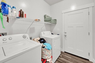Step into this sleek, main-floor condo located in one of Utah's - photo 15