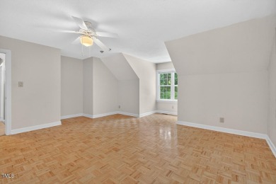 Tucked away on a tree-lined lot with fenced yard, this