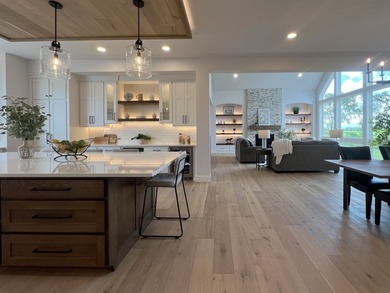 Step into this sunlight-filled home with Amish made built-ins - photo 9
