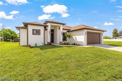 LOCATION! Welcome to 7 SW 19th Pl, Cape Coral, a stunning - photo 3