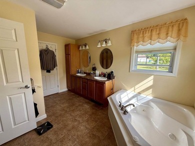 End-of-the-road privacy meets stunning riverfront living in this - photo 17
