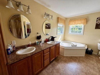 End-of-the-road privacy meets stunning riverfront living in this - photo 19