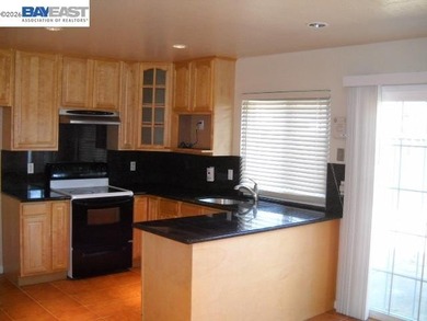 This Glen Eden townhome is ideal for a first-time buyer or - photo 3
