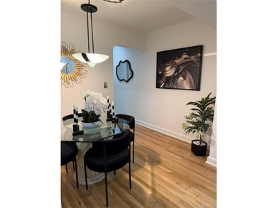 Rarely available, top-floor corner residence at coveted - photo 5