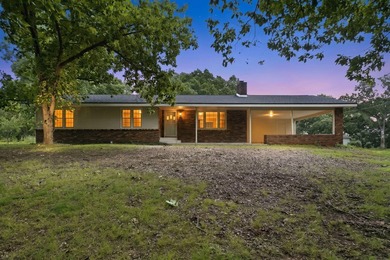 Just minutes from Stockton Lake, this move-in ready home sits on - photo 2