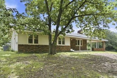 Just minutes from Stockton Lake, this move-in ready home sits on - photo 3