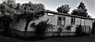 Enjoy easy living in this sweet 2-bedroom, 2-bath manufactured