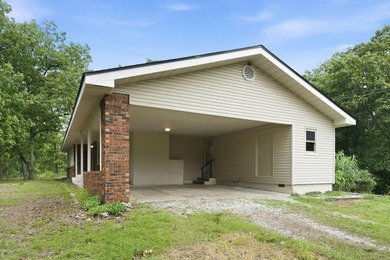Just minutes from Stockton Lake, this move-in ready home sits on - photo 5