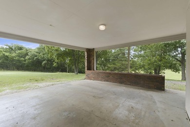 Just minutes from Stockton Lake, this move-in ready home sits on - photo 6