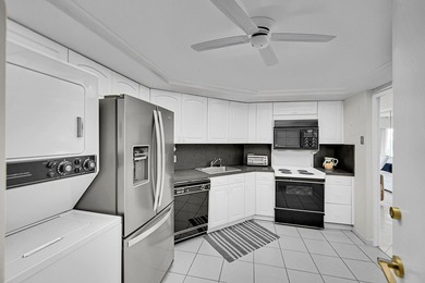 Experience the ultimate coastal lifestyle in this rarely - photo 16