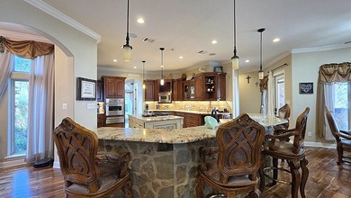 Discover this waterfront, Mediterranean-style retreat at The - photo 18