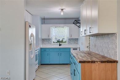 Welcome to this charming San Carlos Park home offering endless - photo 4