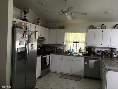 Welcome to this well-maintained 3-bedroom, 2-bath home in the - photo 5